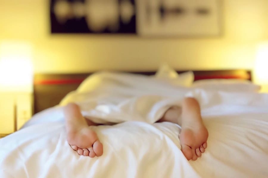 Feet off of bed