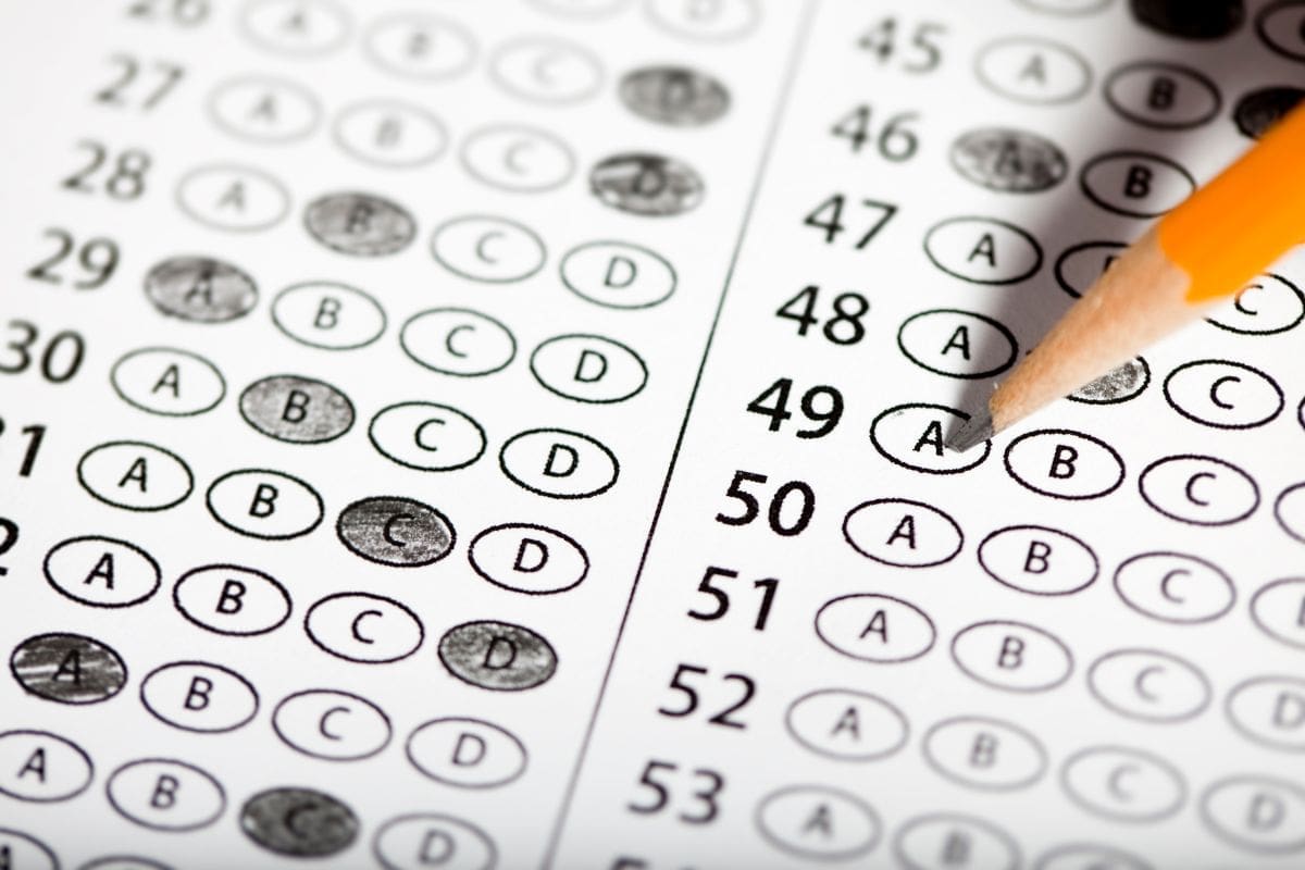 a close up of multiple choice bubbles on a test with some filled in