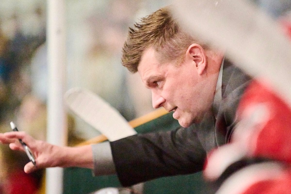 Hockey – Ty Valin Head Coach Close-up candid photograph of Nait's newest hockey coach, Ty Valin waving down from a packed stadium
